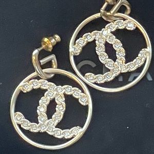 SOLD!! CHANEL metal and strass earrings.